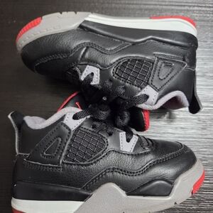 Jordan Kids Black Sneakers with Red and Gray Accents